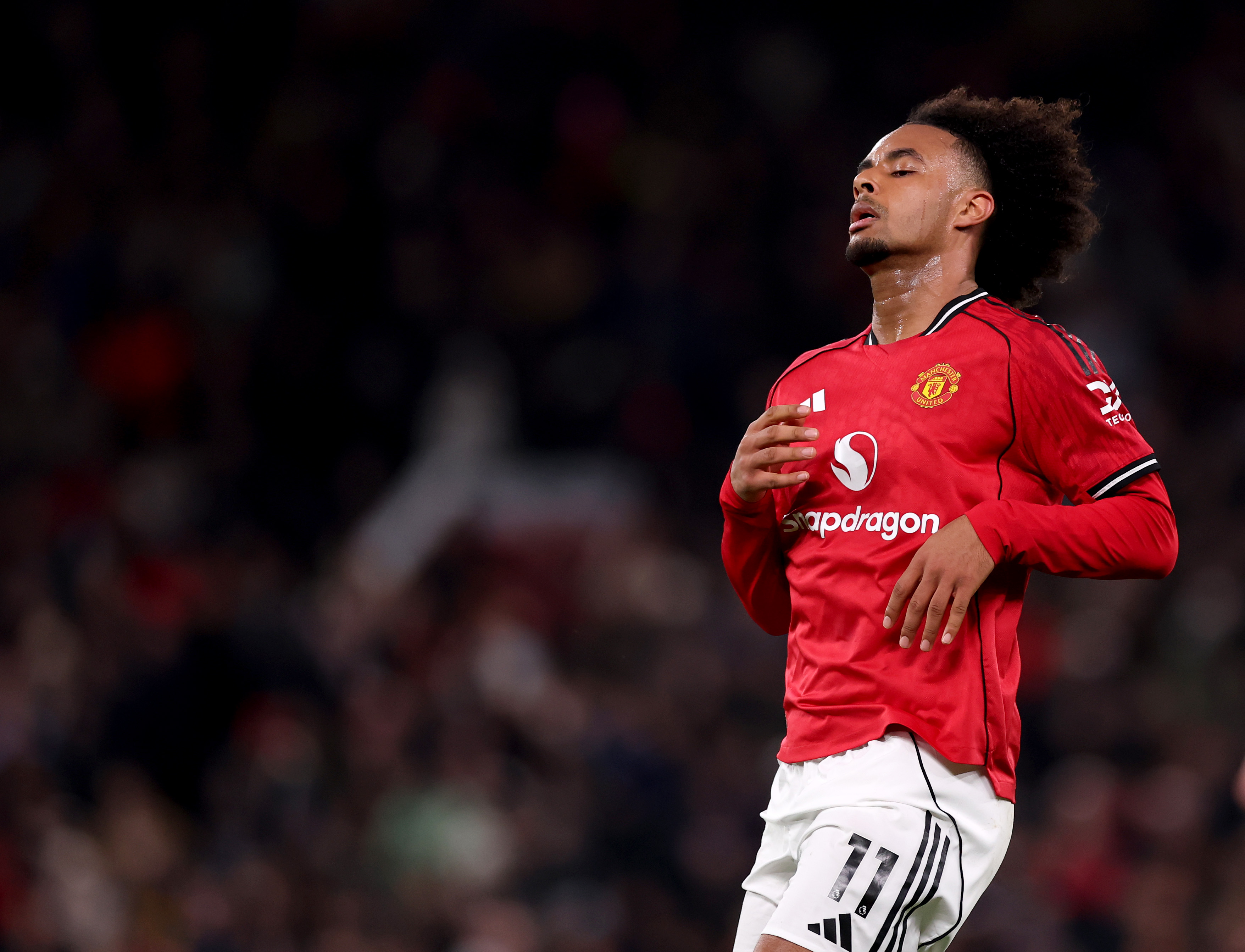Joshua Zirkzee looks exasperated while in action for Man United.