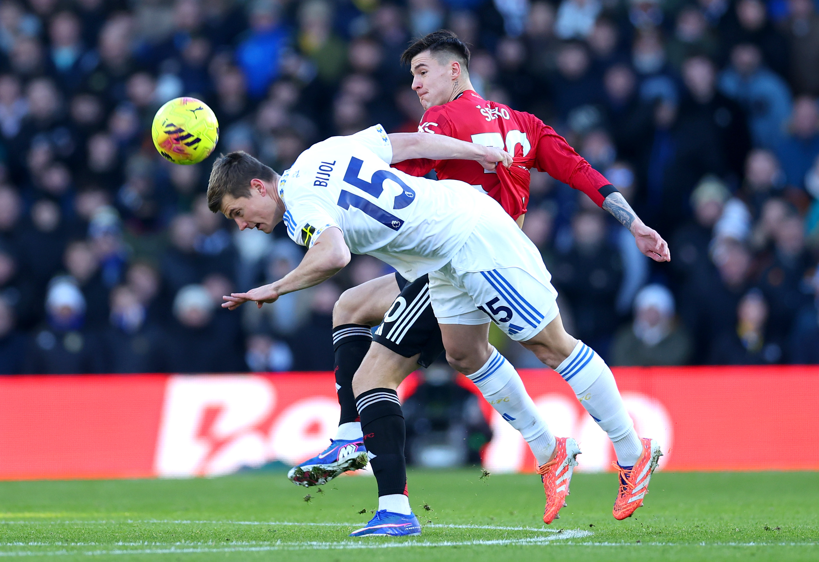 Benjamin Sesko vies with Jaka Bijol of Leeds.