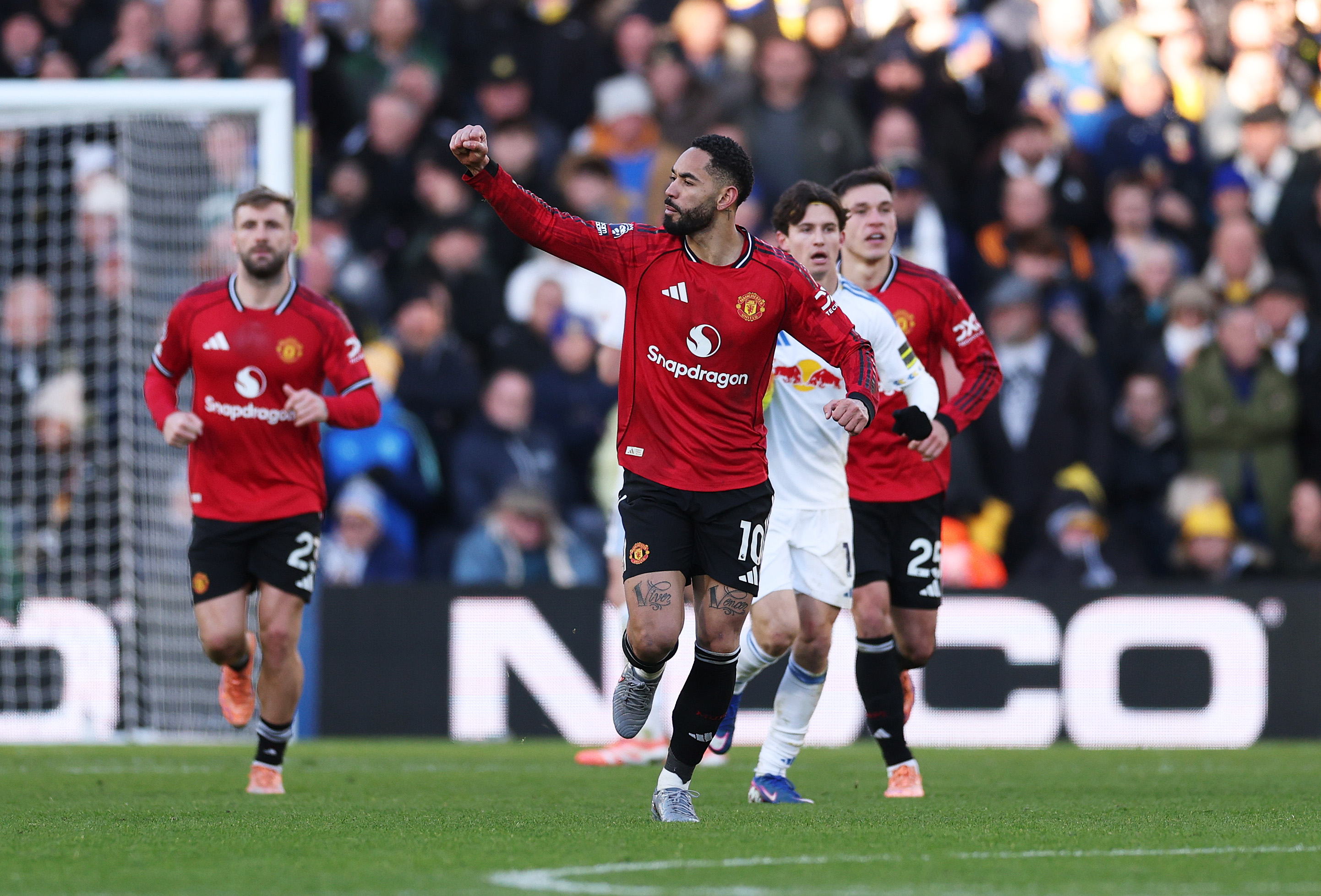 Matheus Cunha celebrates after equalising vs Leeds.