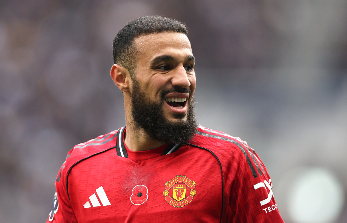 Noussair Mazraoui looks on while in action for Man United.