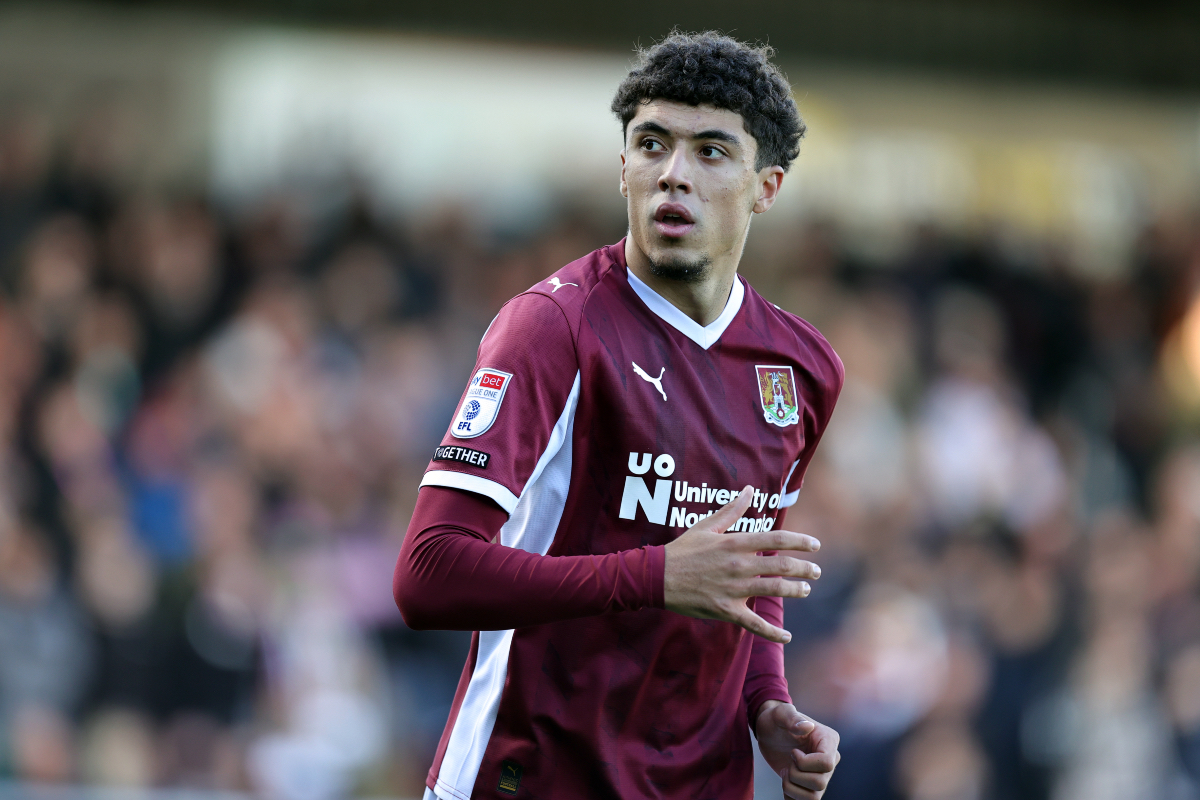 Ethan Wheatley runs while in action for Northampton Town.