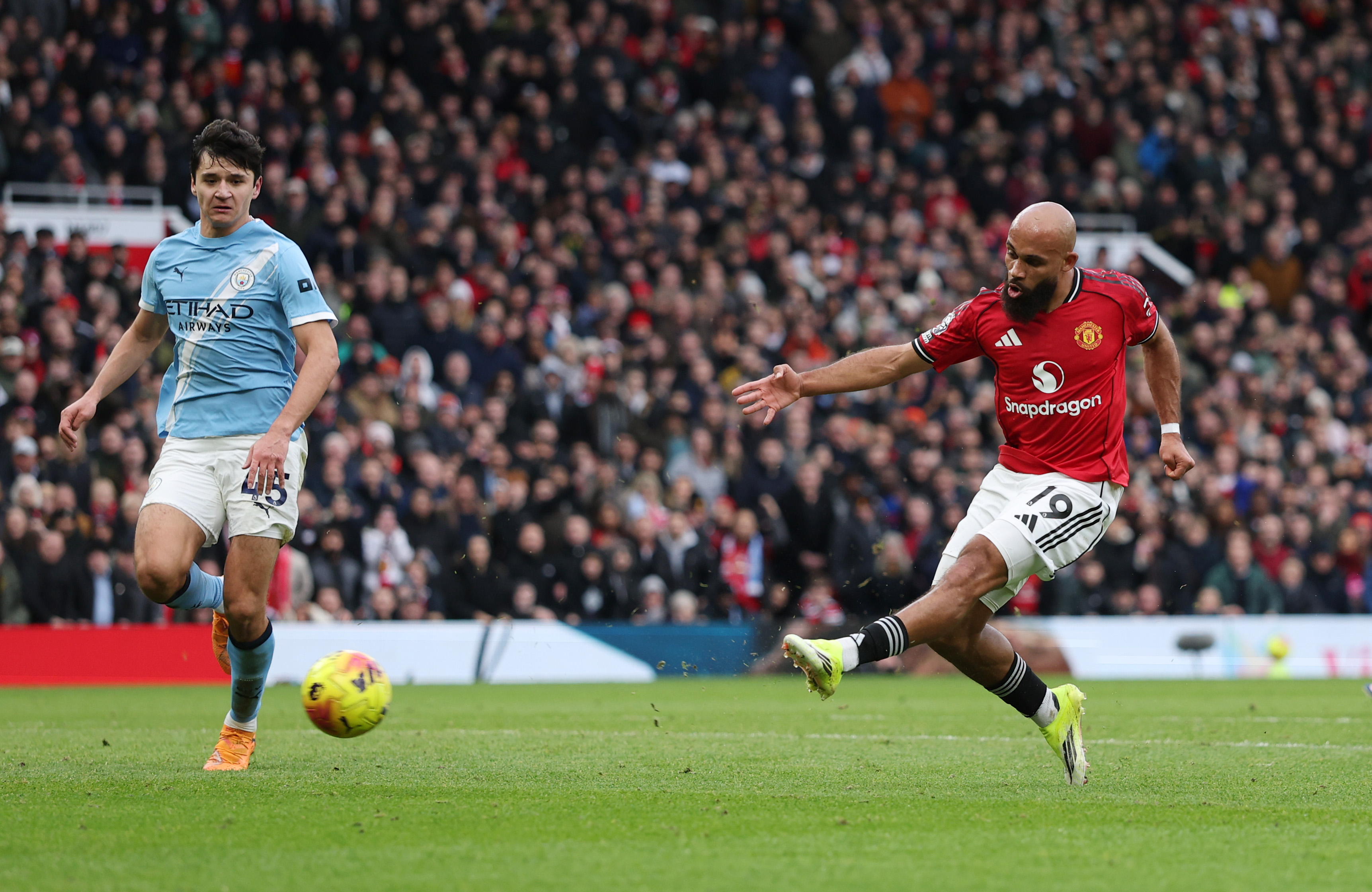 Bryan Mbeumo scoring against Man City