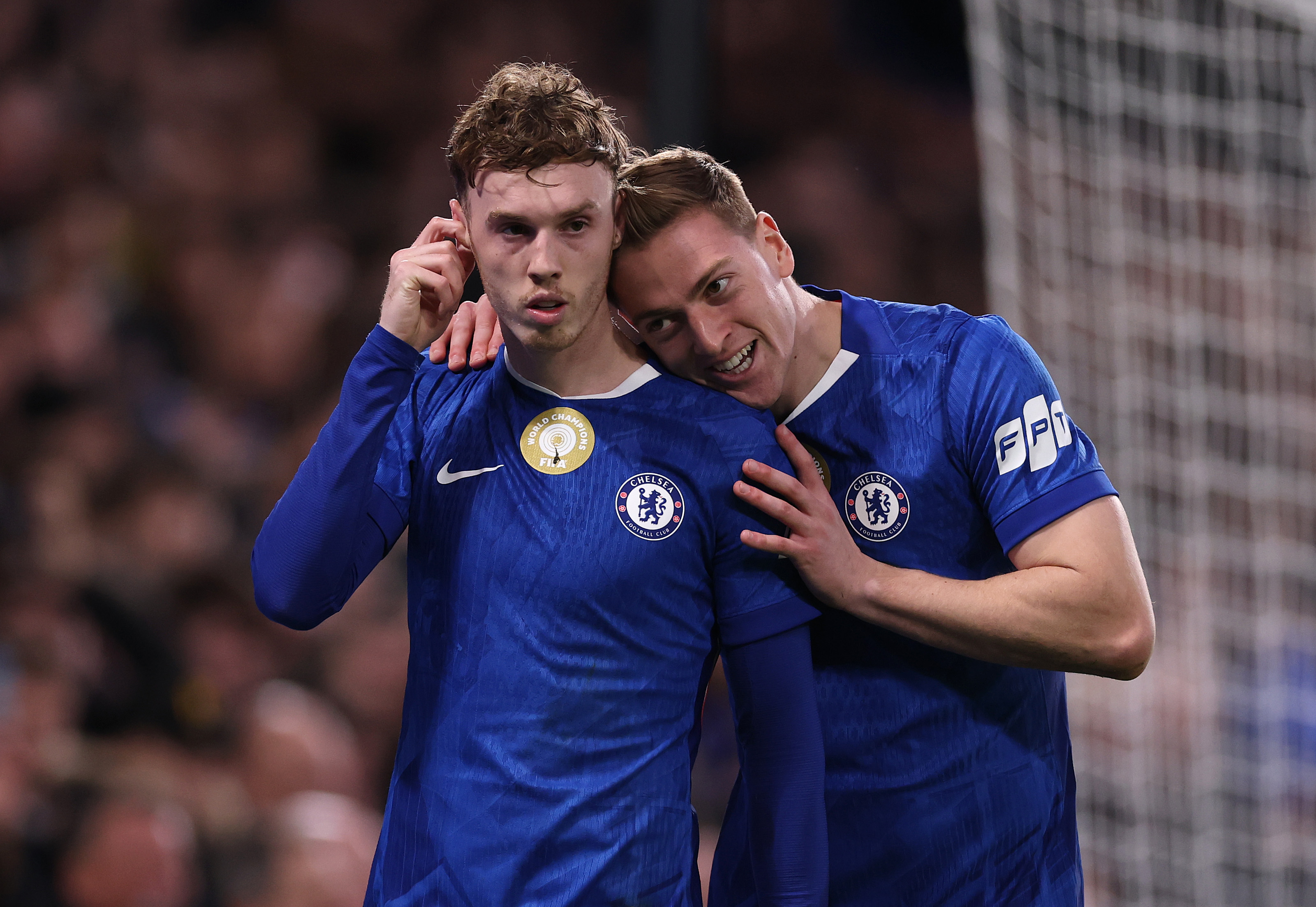 Cole Palmer celebrates with Liam Delap after scoring for Chelsea.