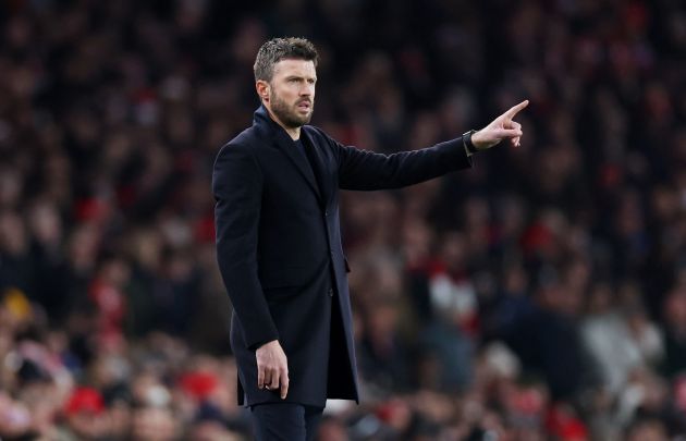Michael Carrick gestures from the touchline at the Emirates