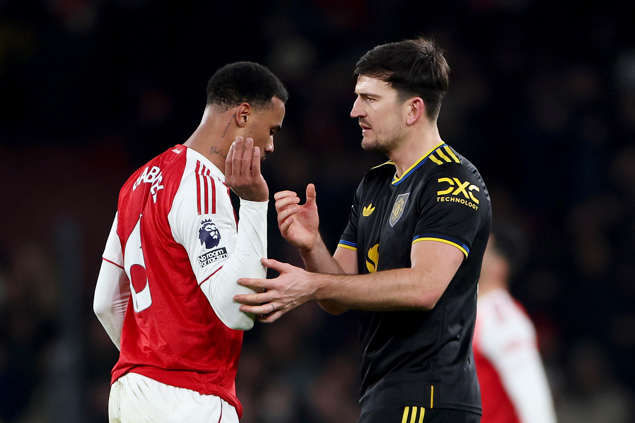 Harry Maguire shakes hands with Arsenal’s Gabriel at full-time. 
