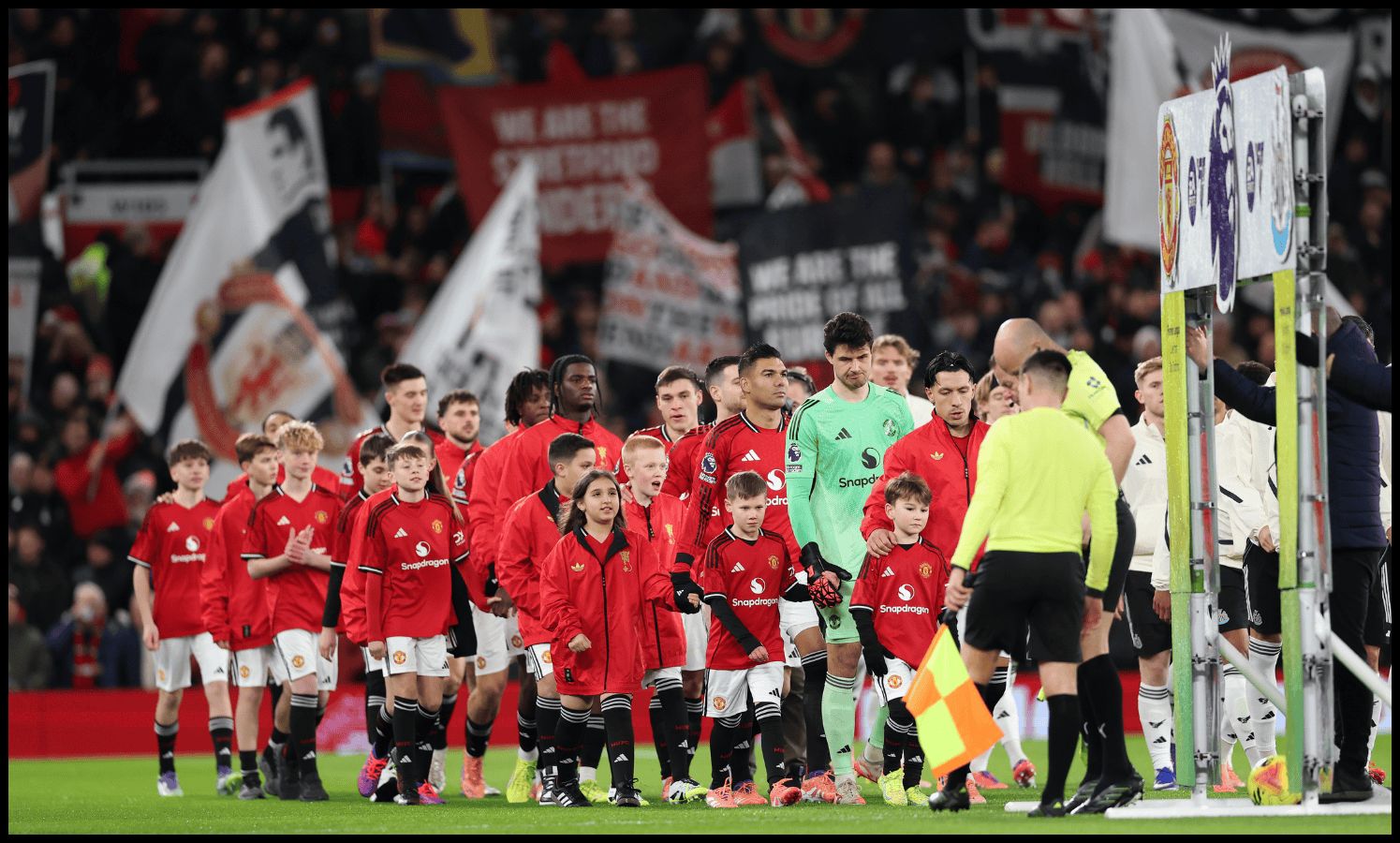Man United and Brighton players walk out at Old Trafford.