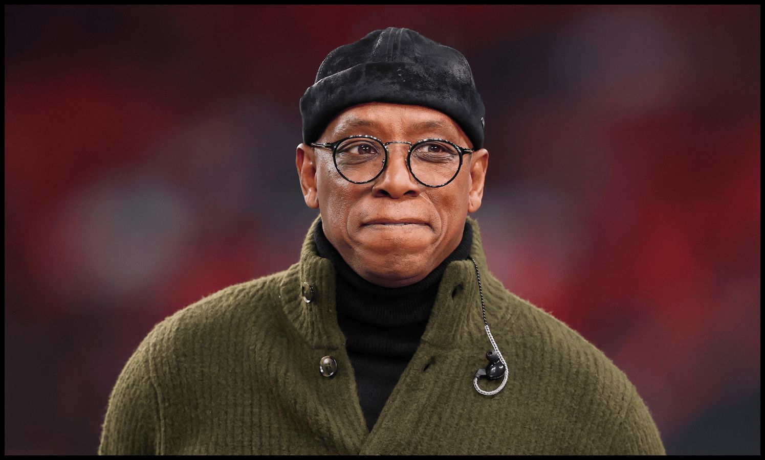 Ian Wright looks on while on punditry.