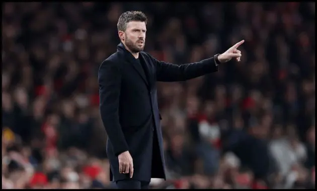 Michael Carrick gestures from the touchline at the Emirates.