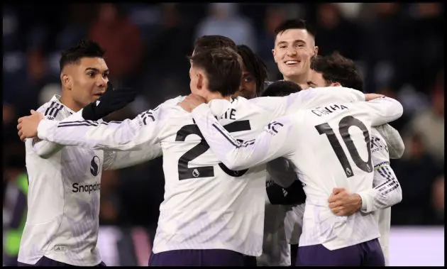 Benjamin Sesko smiles as he celebrates his goal with his teammates.