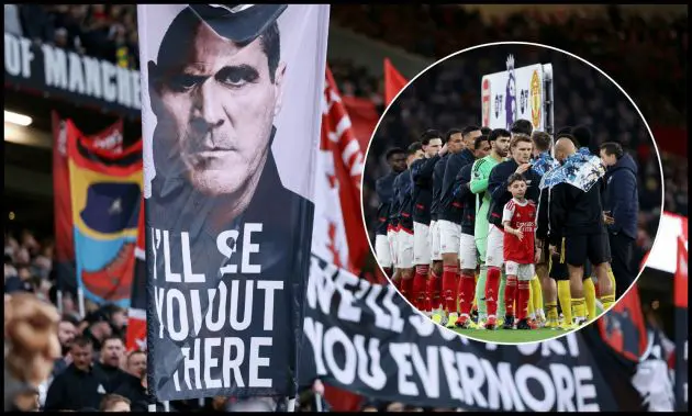 Man United fans hold up a Roy Keane flag at Old Trafford.