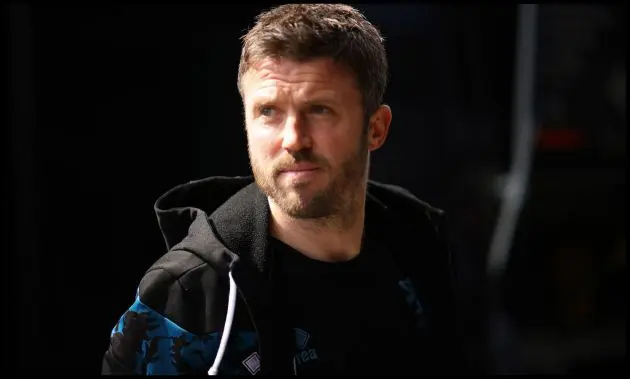 Michael Carrick looking on