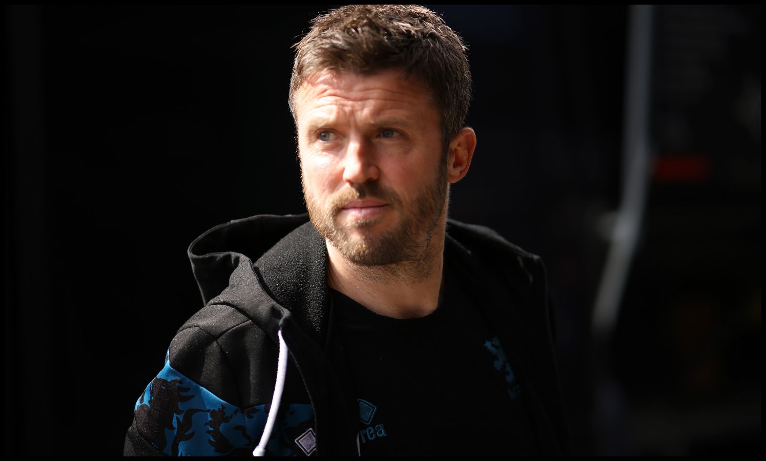 Michael Carrick looking on