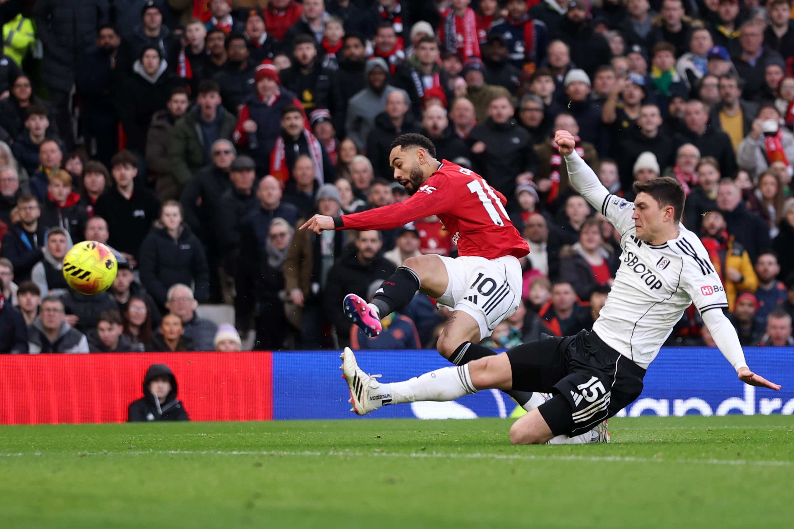 Matheus Cunha shoots and scores to make it 2-0 to United against Fulham at Old Trafford.