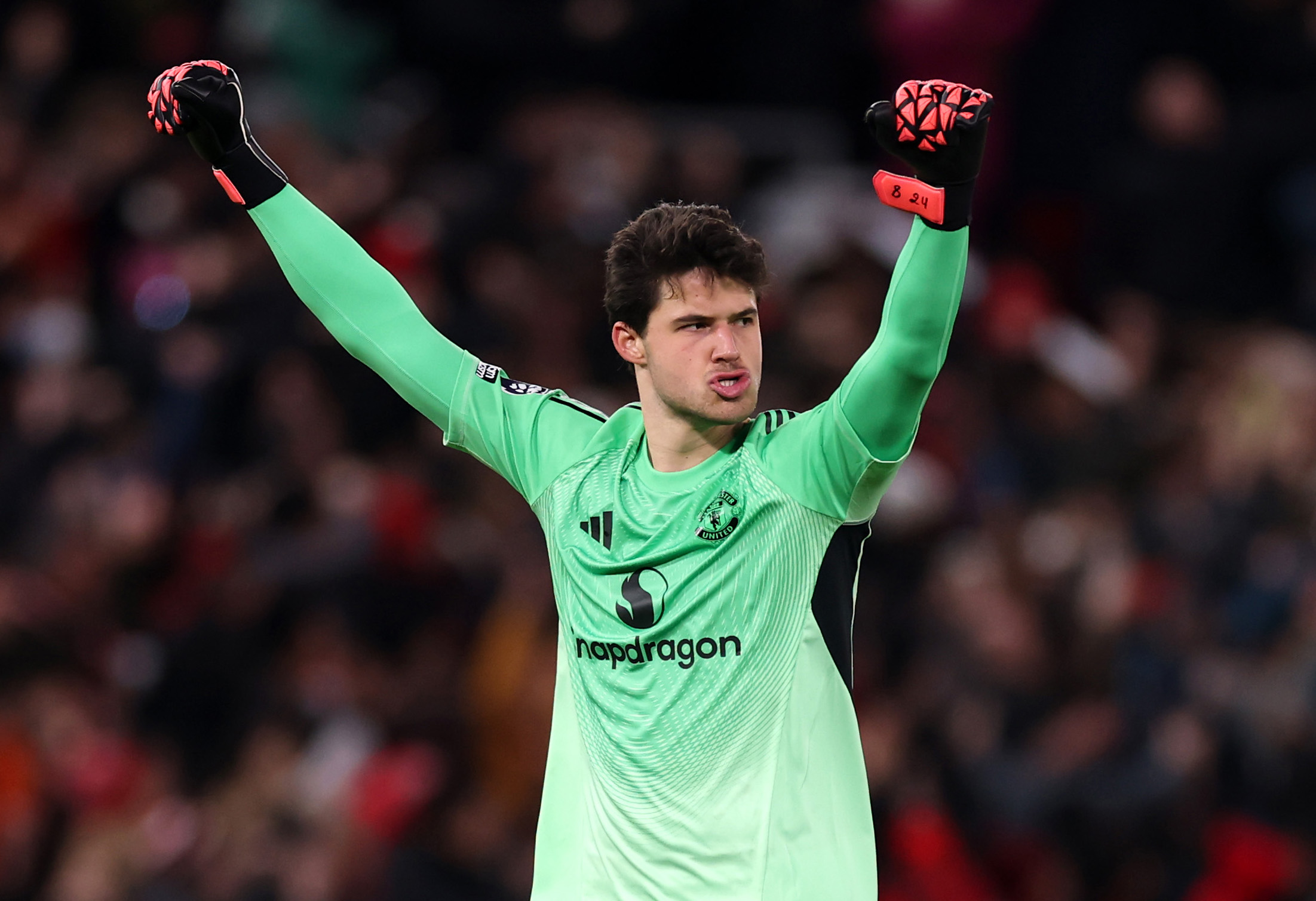 Senne Lammens celebrates Patrick Dorgu scoring for Man Utd.