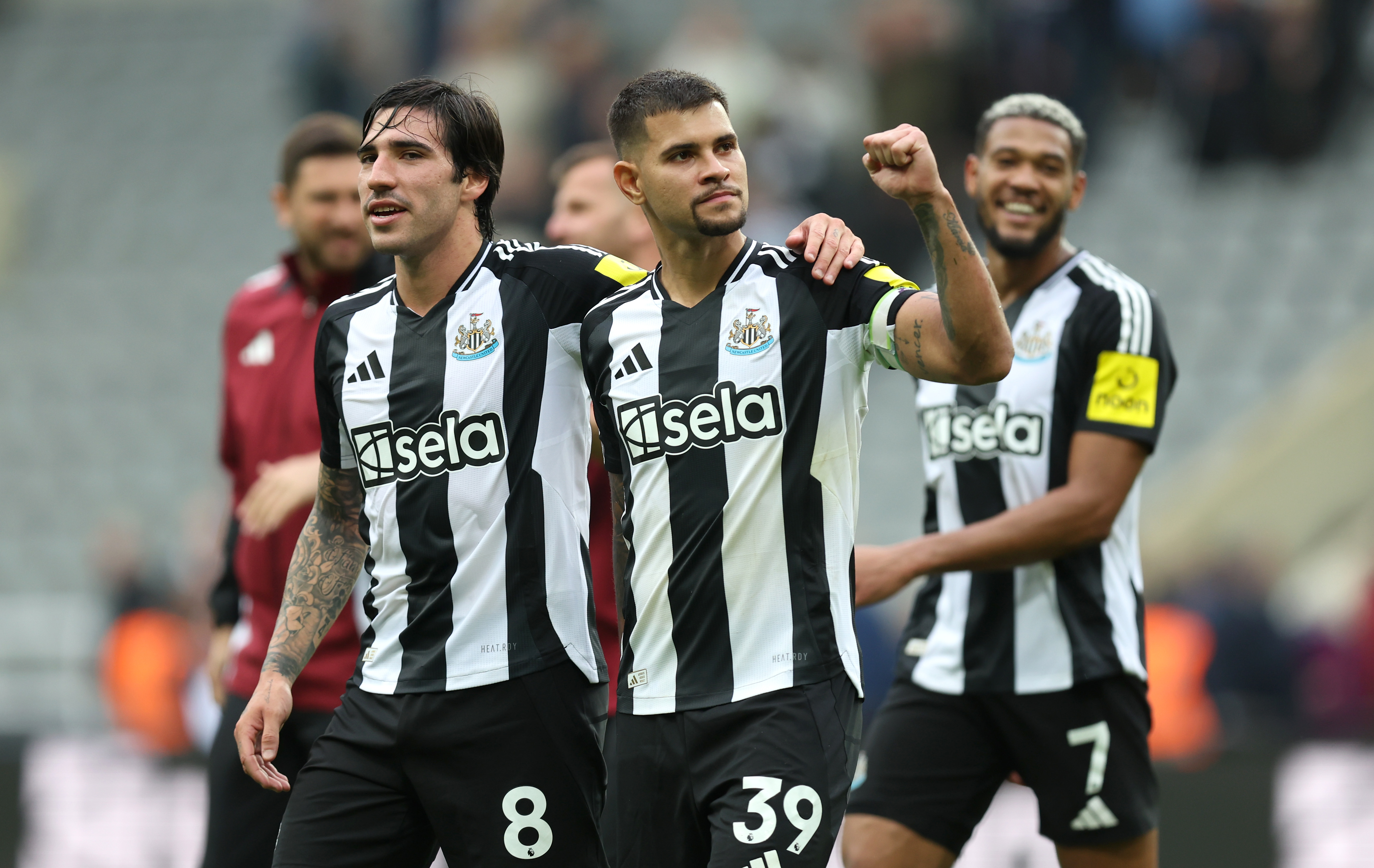 Bruno Guimaraes and Sandro Tonali celebrate after a Newcastle win.
