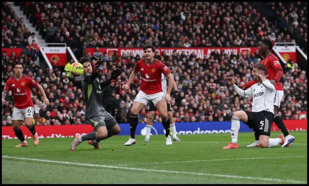 Senne Lammens saves a close-range effort from Fulham’s Joachim Anderson.
