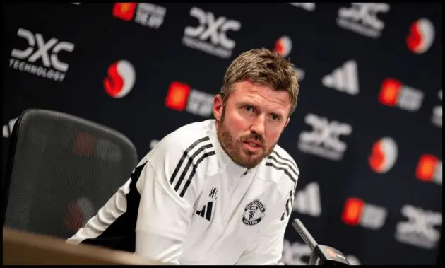 Michael Carrick talks to reporters at a press conference at Carrington.