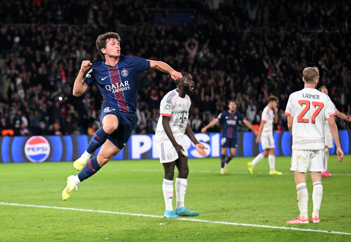 Joao Neves jumps to celebrate after scoring against Bayern Munich.
