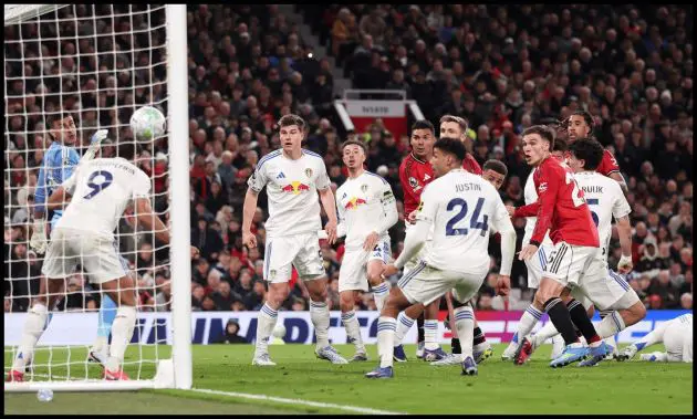 MANCHESTER, ENGLAND - APRIL 13: Dominic Calvert-Lewin of Leeds United clears a shot from Casemiro of Manchester United off the line during the Premier League match between Manchester United and Leeds United at Old Trafford on April 13, 2026 in Manchester, England