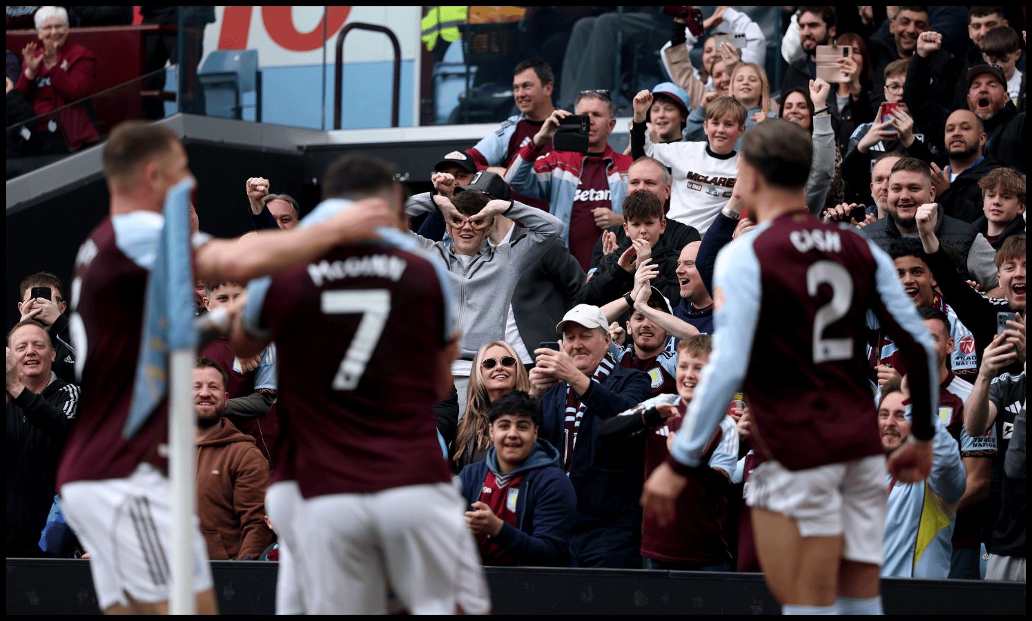 BIRMINGHAM, ENGLAND - MARCH 22: Aston Villa fans celebrate their teams first goal scored by John McGinn of Aston Villa during the Premier League match between Aston Villa and West Ham United at Villa Park on March 22, 2026 in Birmingham, England.