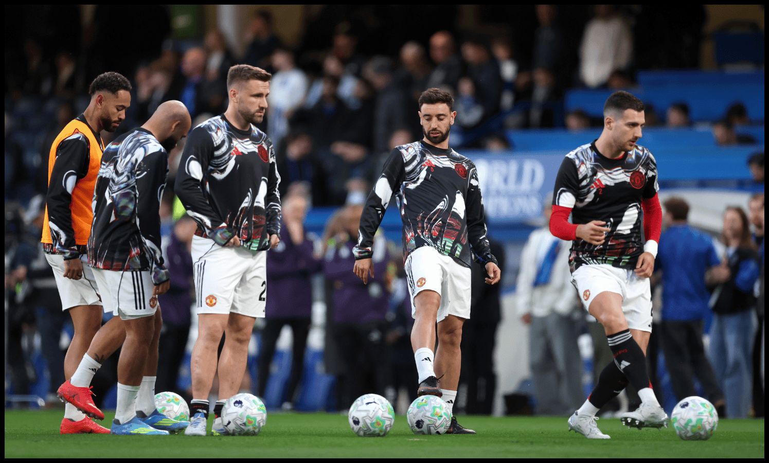 LONDON, ENGLAND - APRIL 18: Bruno Fernandes of Manchester United warms up with teammates prior to the Premier League match between Chelsea and Manchester United at Stamford Bridge on April 18, 2026 in London, England.