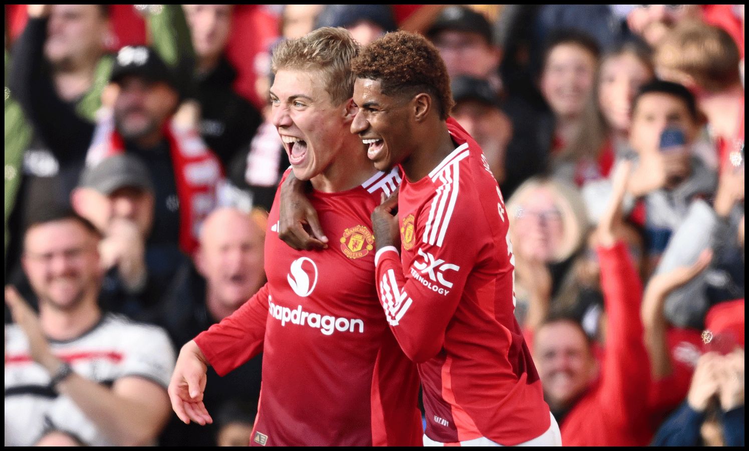 MANCHESTER, ENGLAND - OCTOBER 19: Rasmus Hojlund of Manchester United celebrates scoring his team's second goal with teammate Marcus Rashford during the Premier League match between Manchester United FC and Brentford FC at Old Trafford on October 19, 2024 in Manchester, England.