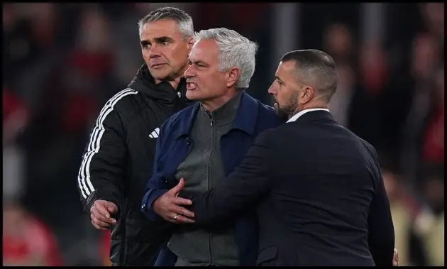 Jose Mourinho being held down