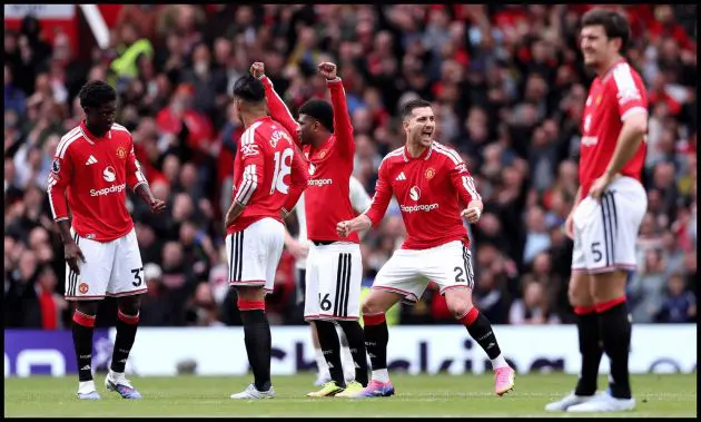 MANCHESTER, ENGLAND - MAY 17: Diogo Dalot of Manchester United and teammates celebrate after a VAR check confirms their second goal stands, scored by teammate Matheus Cunha (not pictured) during the Premier League match between Manchester United and Nottingham Forest at Old Trafford on May 17, 2026 in Manchester, England.