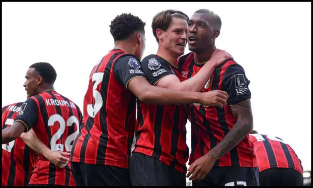 Alex Scott celebrating with Bournemouth teammates