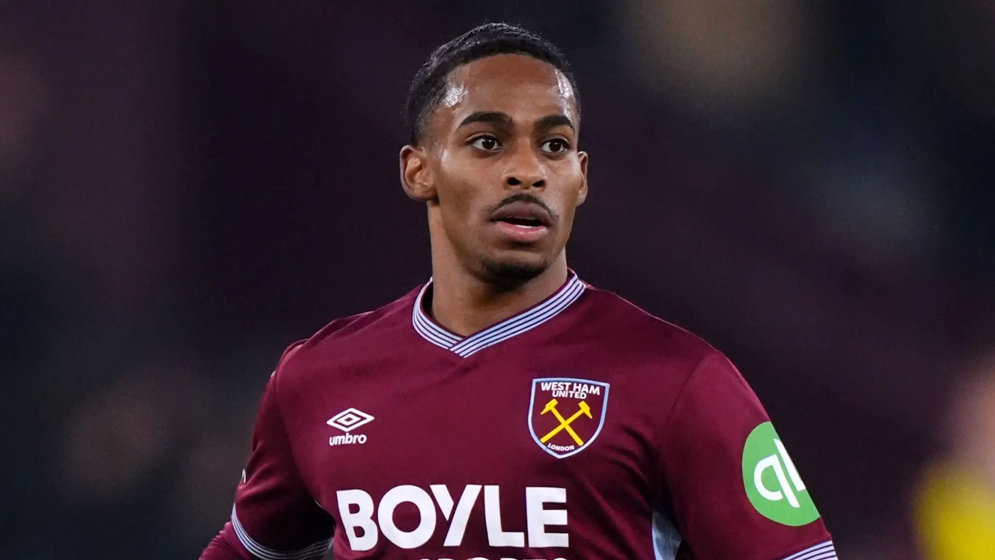 Crysencio Summerville wearing a maroon West Ham United jersey during a match.