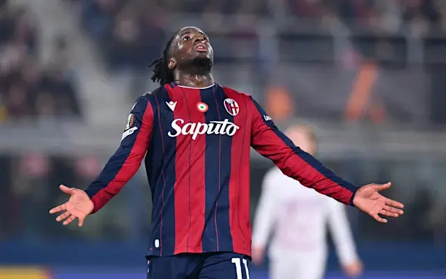 Jonathan Rowe celebrating in a CF Montréal red and blue striped jersey during a match