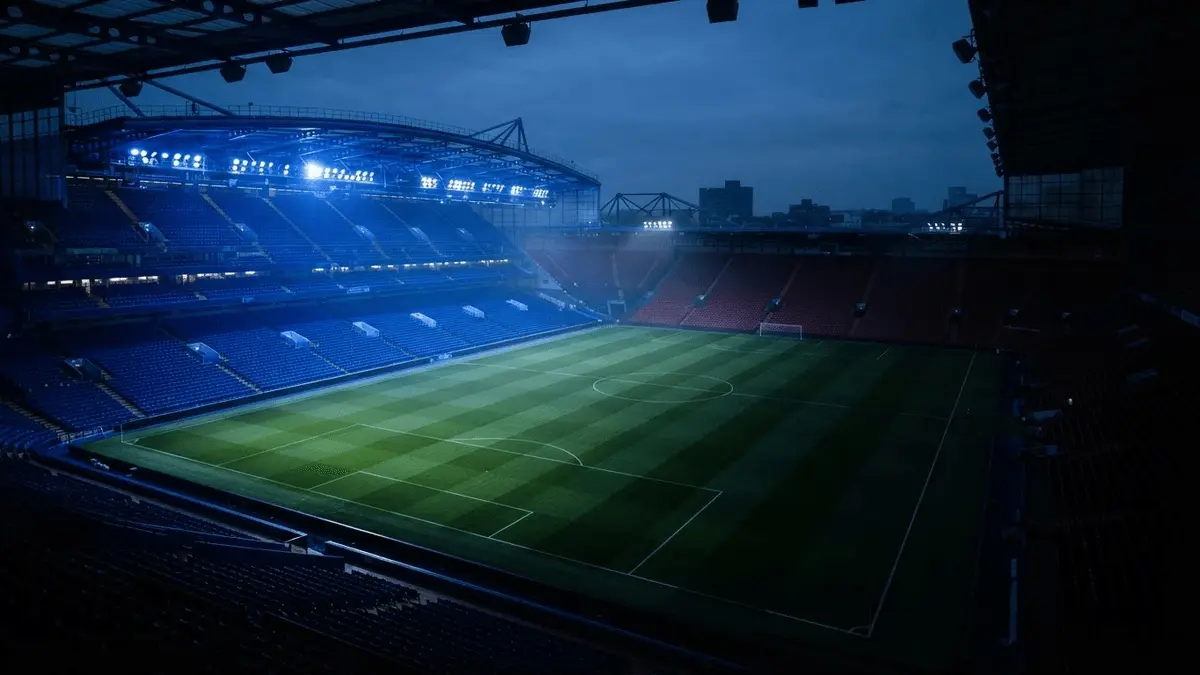 Stadium split between illuminated Chelsea blue and shadowed red representing transfer power imbalance