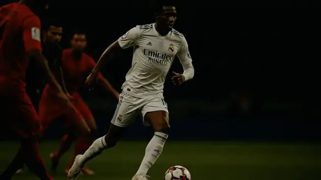 Aurélien Tchouameni playing for Real Madrid in midfield action during a match
