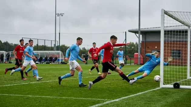 Manchester United U18 players battle Manchester City in a tense youth derby at Carrington