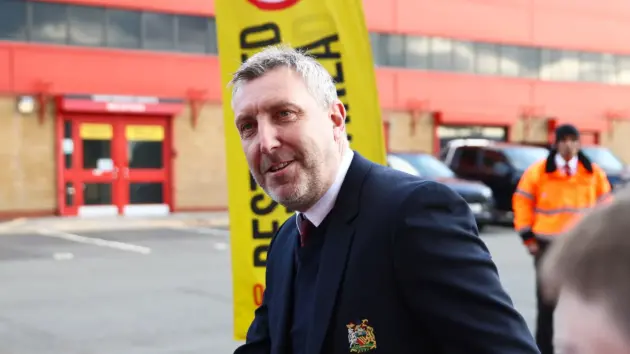 Manchester United Technical Director Jason Wilcox wearing a dark suit and blazer.